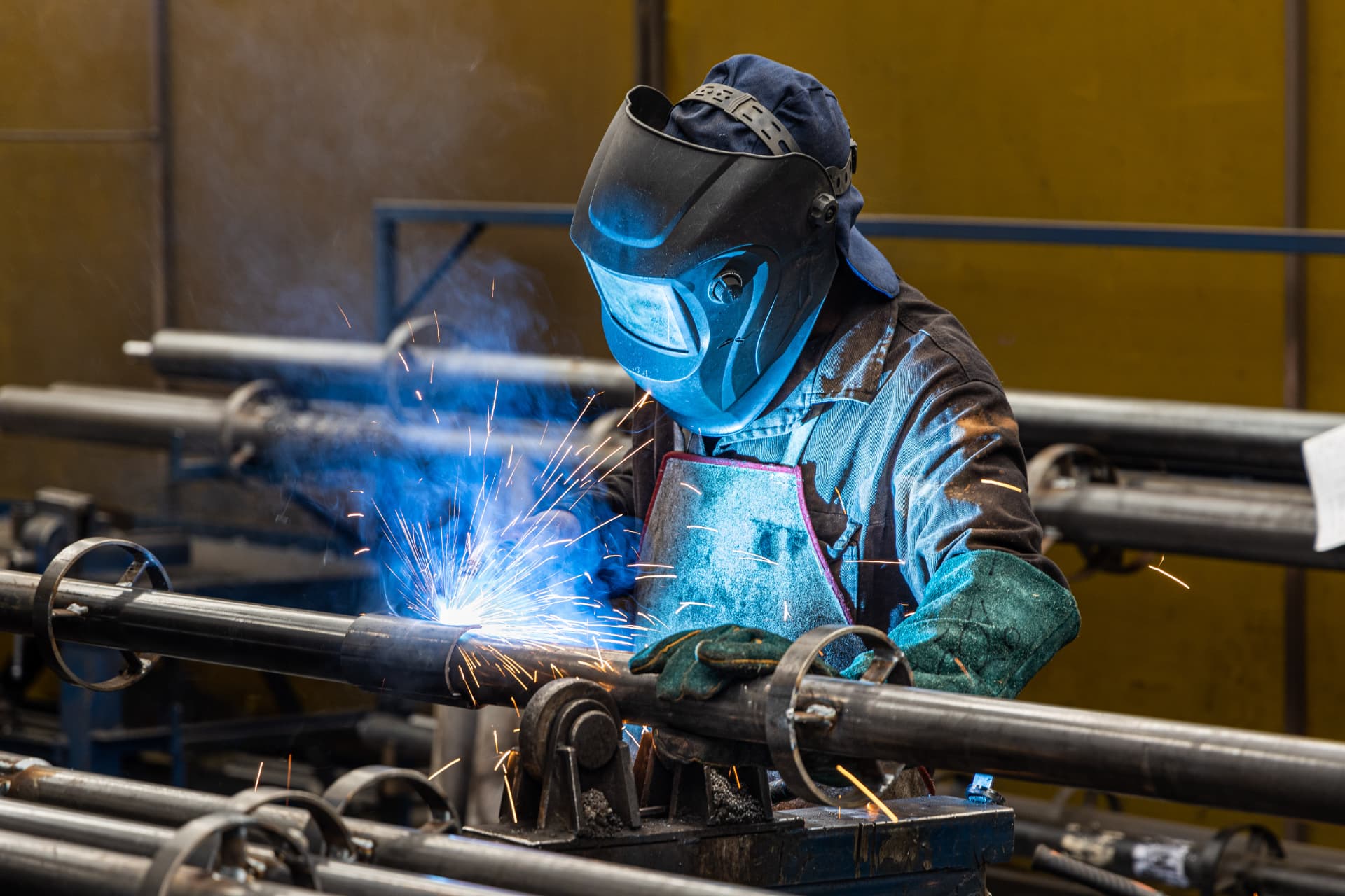 MRD welder working on a roller shutter door shaft