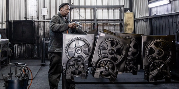 MRD technician finishing roller door gearboxes